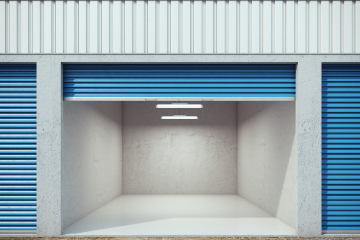 Empty storage unit with opened door